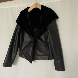 Black jacket by ISDA & co size small, button in front came loose & fell off.